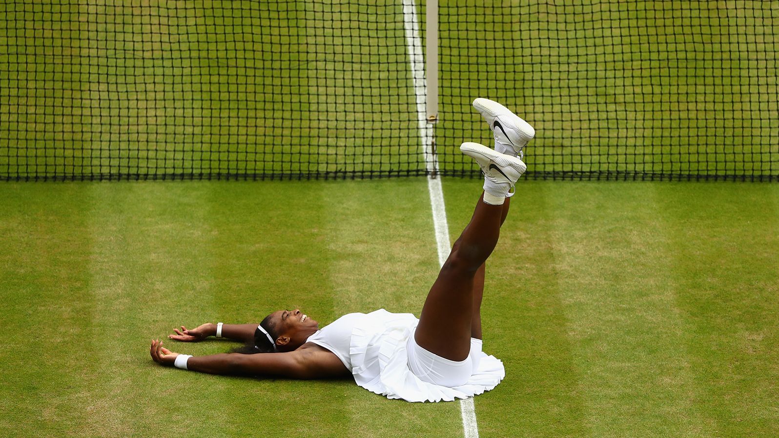 Williams celebrates her Wimbledon title in 2016. It was her seventh win at Wimbledon, and her <a href="index.php?page=&url=https%3A%2F%2Fwww.cnn.com%2F2016%2F07%2F09%2Ftennis%2Fwimbledon-serena-williams-angelique-kerber-tennis%2F" target="_blank">22nd grand slam title.</a> That tied her with Steffi Graf for the most singles titles in the Open era of professional tennis.