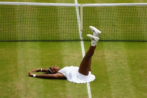 Williams celebrates her Wimbledon title in 2016. It was her seventh win at Wimbledon, and her <a href=