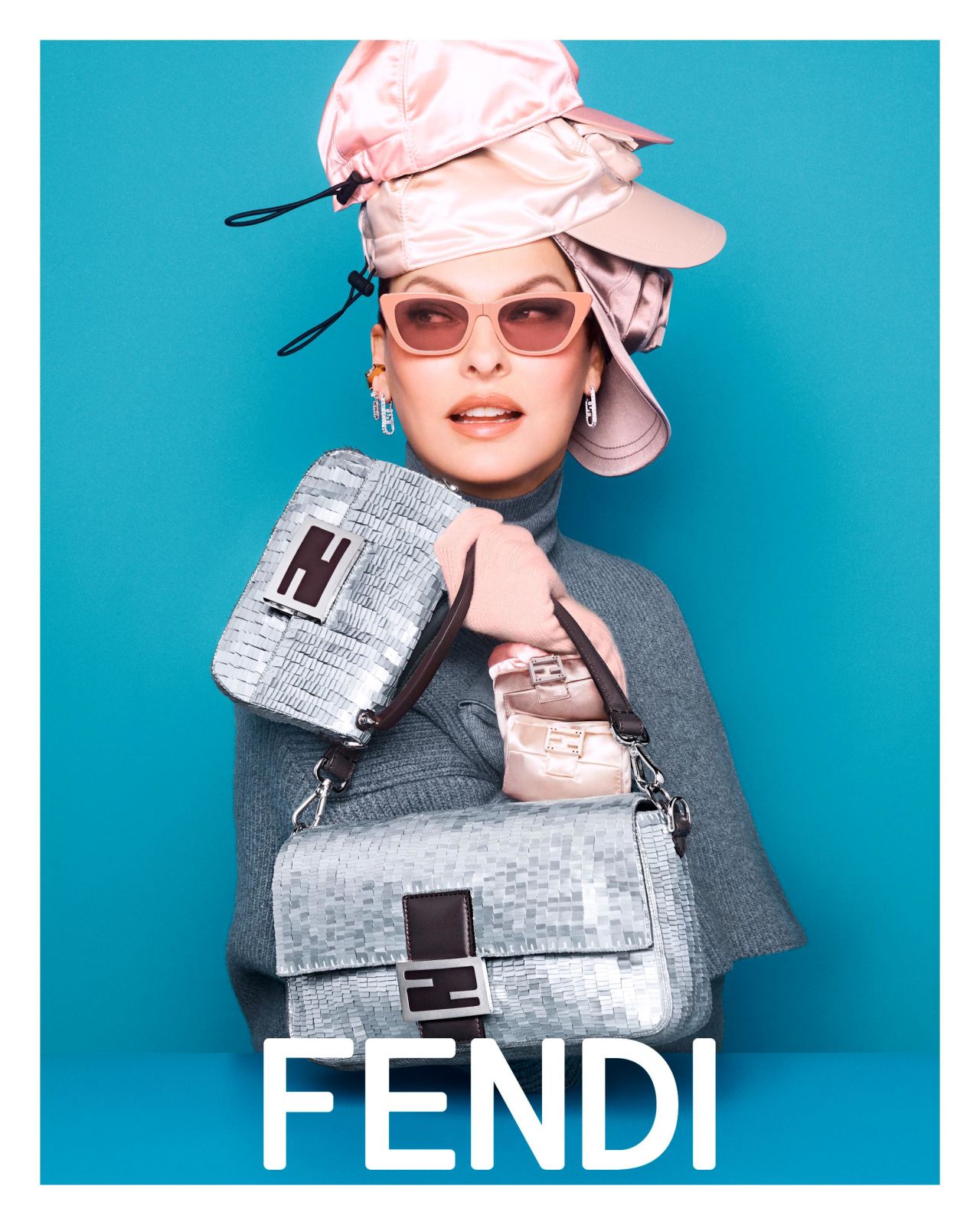 Linda Evangelista in a new campaign for Fendi unveiled this week, her first modeling job since claiming she was "disfigured" by a fat-freezing treatment called CoolSculpt in 2021. The image, shot by Steven Meisel, is in celebratation of the Fendi Baguette bag's 25th anniversary, designed by Silvia Venturini Fendi.