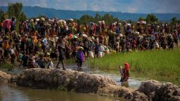 Muslim Rohingya refugees, fled from ongoing military operations in Myanmars Rakhine state, try to cross the border in Palongkhalii of Cox's Bazar, Bangladesh on October 16, 2017. 