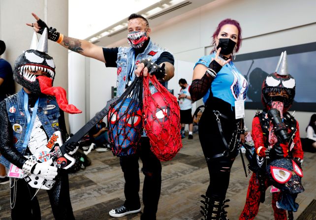 The Tirado family shows off their Spider-Man and Venom-inspired costumes on July 21.