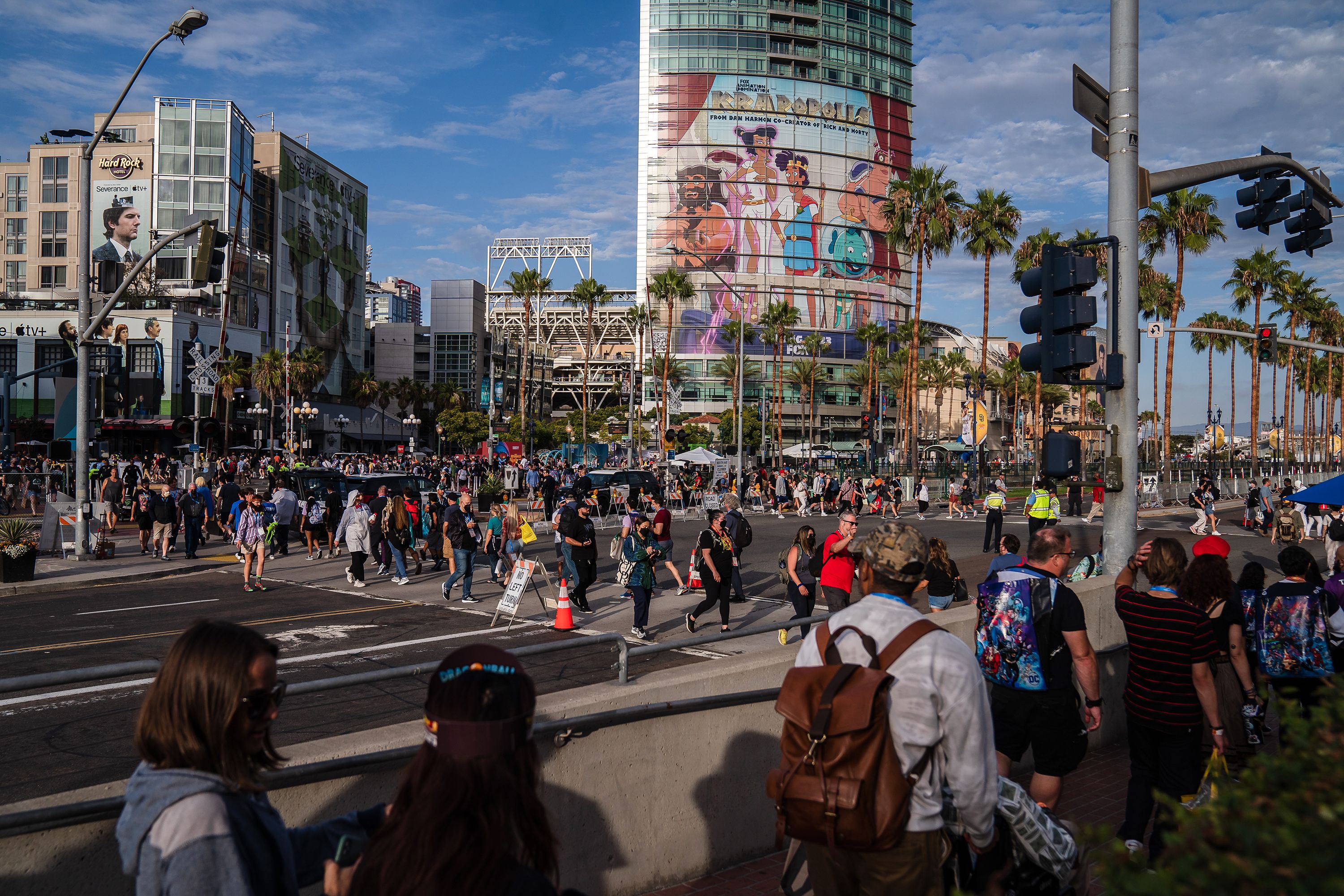 People walk near the San Diego Convention Center on July 21.