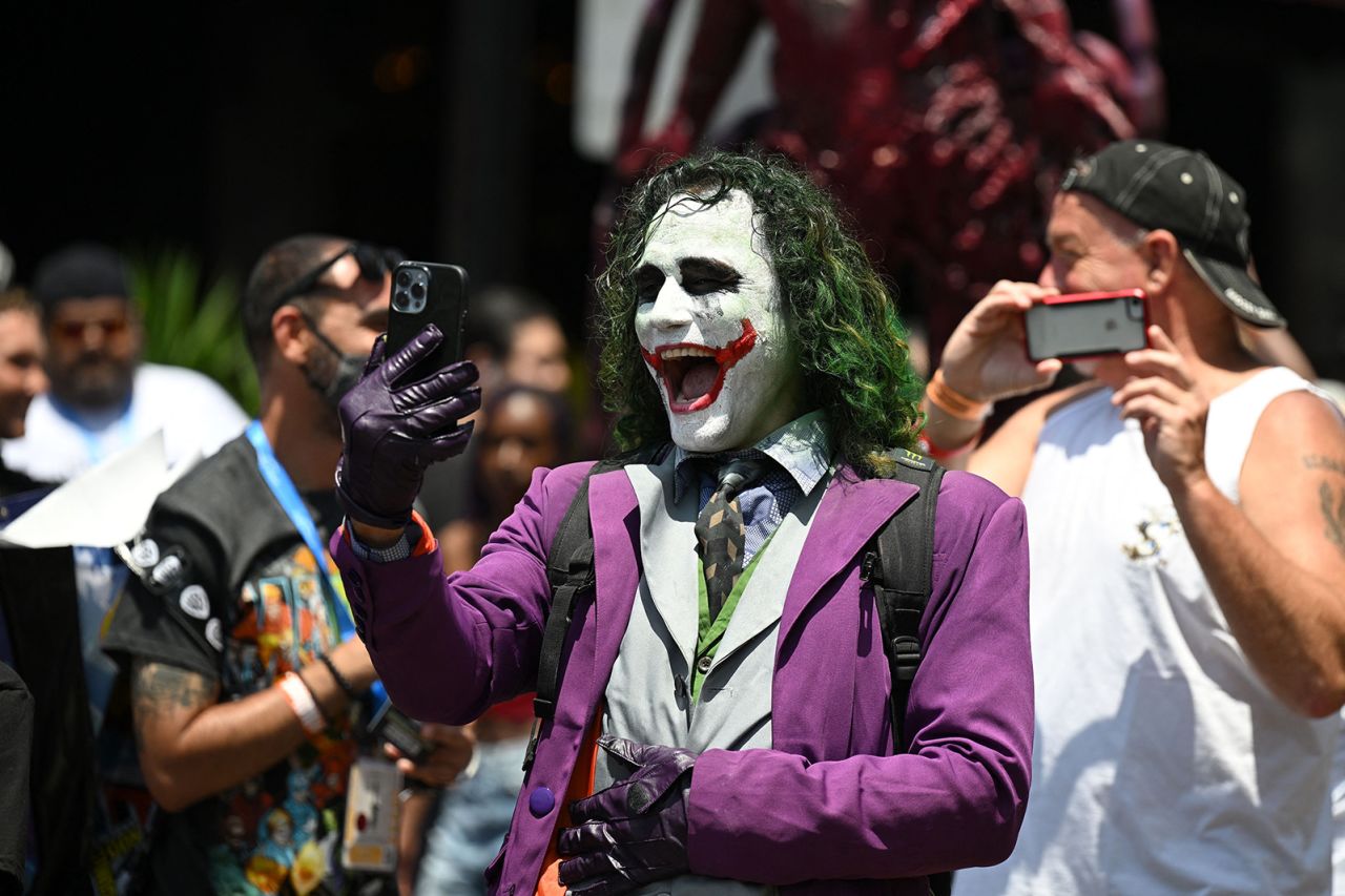 A cosplayer dressed as The Joker from DC Comics laughs at Comic-Con in San Diego, California, on Friday, July 22.