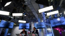 Co-owners of cable channel Dozhd (TV Rain), Natalya Sindeyeva (L) and Alexander Vinokurov  (R) attend a press conference at the channel office in Moscow , on February 4, 2014. Russia's top opposition cable channel Dozhd (TV Rain) known for its critical coverage of Putin faced today the prospect of closure after a major cable operator said it would take the station off the air. AFP PHOTO/ VASILY MAXIMOV        (Photo credit should read VASILY MAXIMOV/AFP via Getty Images)