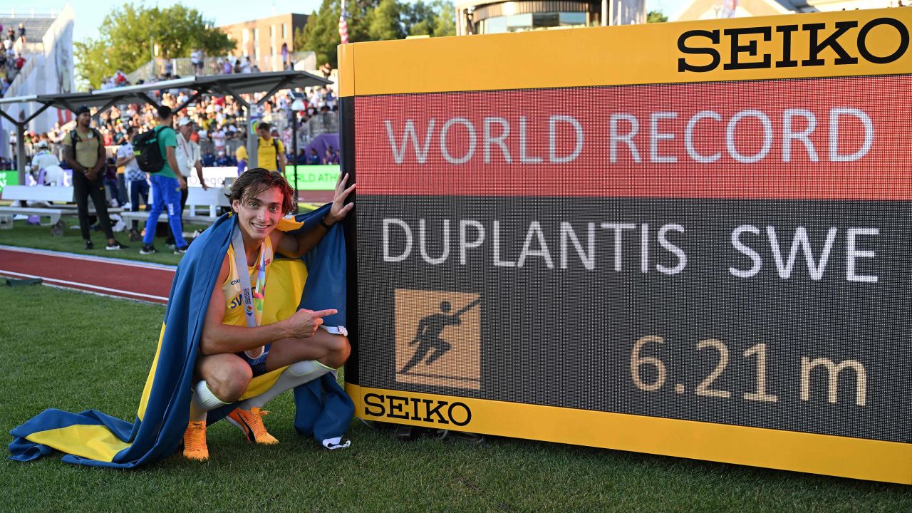 Armand Duplantis celebrates setting a world record in the men's pole vault at the World Athletics Championships.