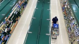 People shop at a supermarket in Arlington, Virginia, June 10, 2022. 
