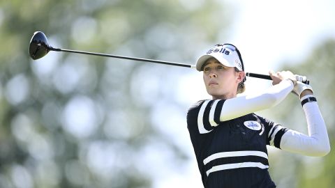 Korda plays her tee shot on the 13th hole.