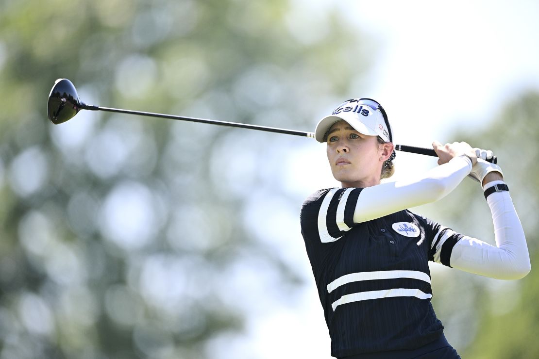 Korda plays her tee shot on the 13th hole.