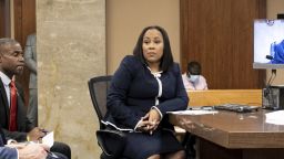 Fulton County District Attorney Fani Willis, center, sits with her team during proceedings to seat a special purpose grand jury in Fulton County, Georgia, on Monday, May 2, 2022, to look into the actions of former President Donald Trump and his supporters who tried to overturn the results of the 2020 election. The hearing took place in Atlanta. (AP Photo/Ben Gray)