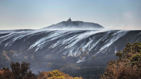 Burned areas are seen on Mont Saint-Michel de Brasparts in Saint-Rivoal, France, on July 22.