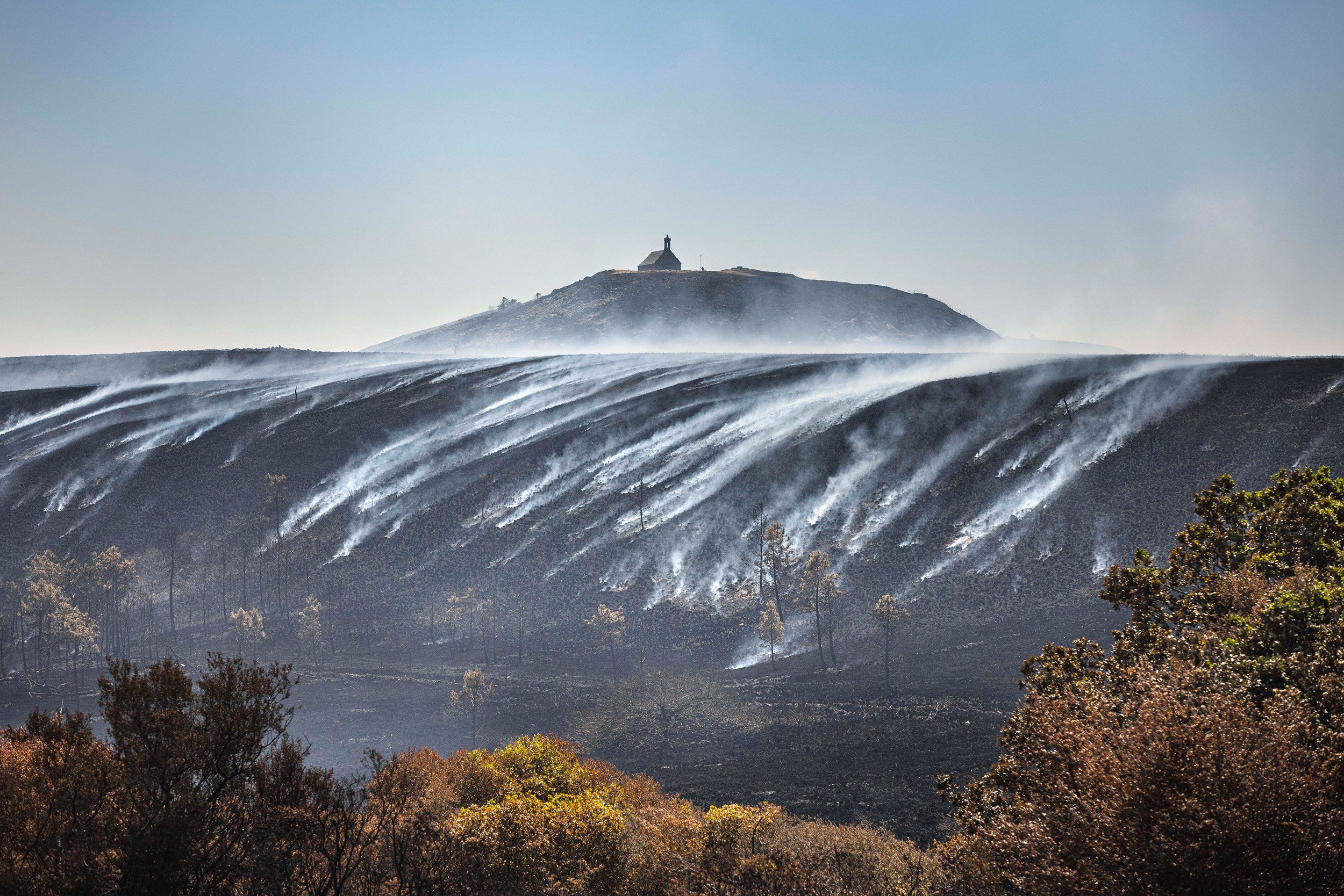 Burned areas are seen on Mont Saint-Michel de Brasparts in Saint-Rivoal, France, on July 22.