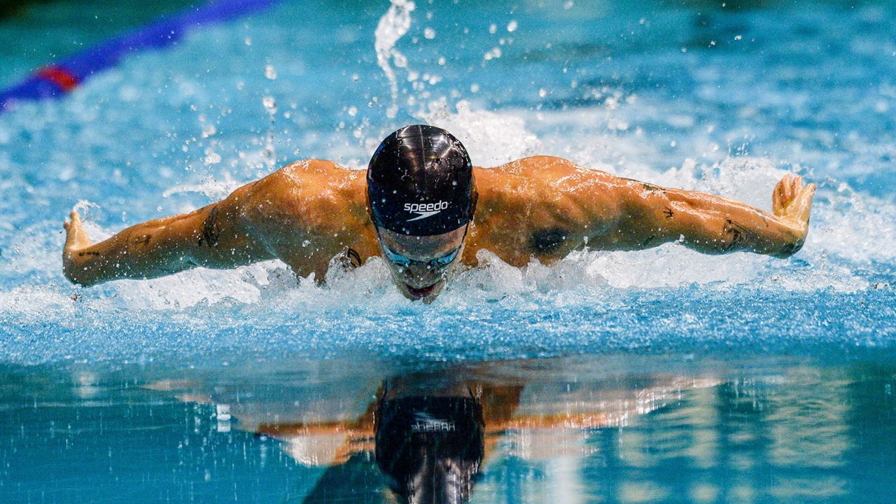 Cody Simpson competes in a men's 100m butterfly heat at last year's Australian Olympic trials.