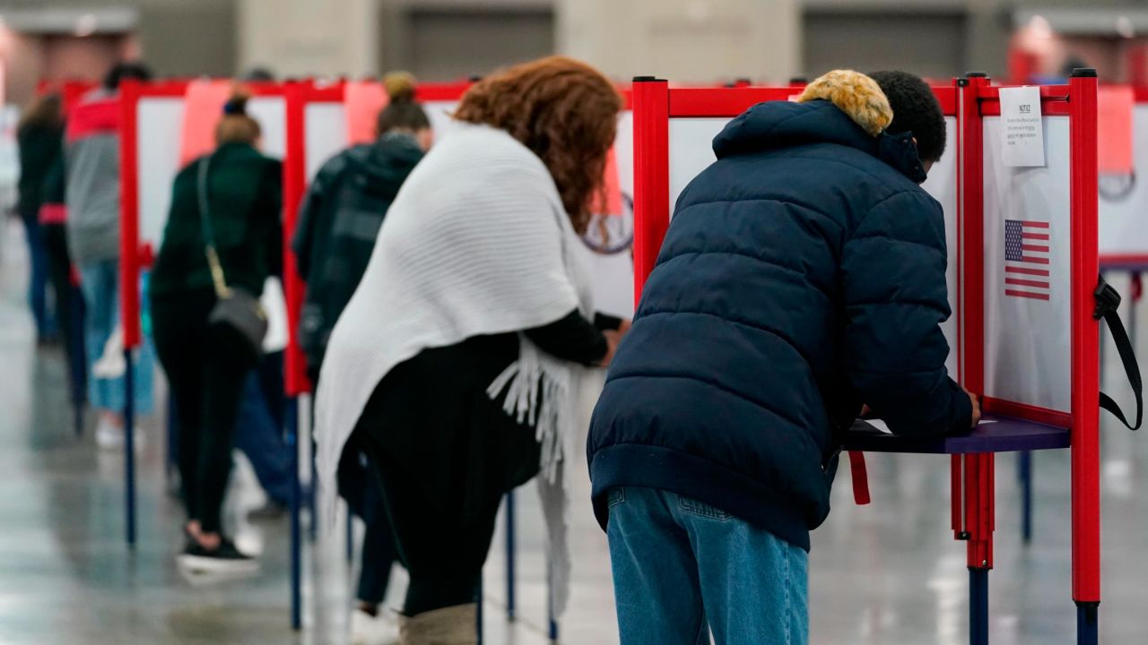 Voters mark their ballots on Election Day in 2020 at the Kentucky Exposition Center in Louisville.
