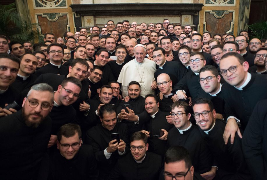The Pope poses with members of the International Rural Catholic Association while at the Vatican in December 2016.