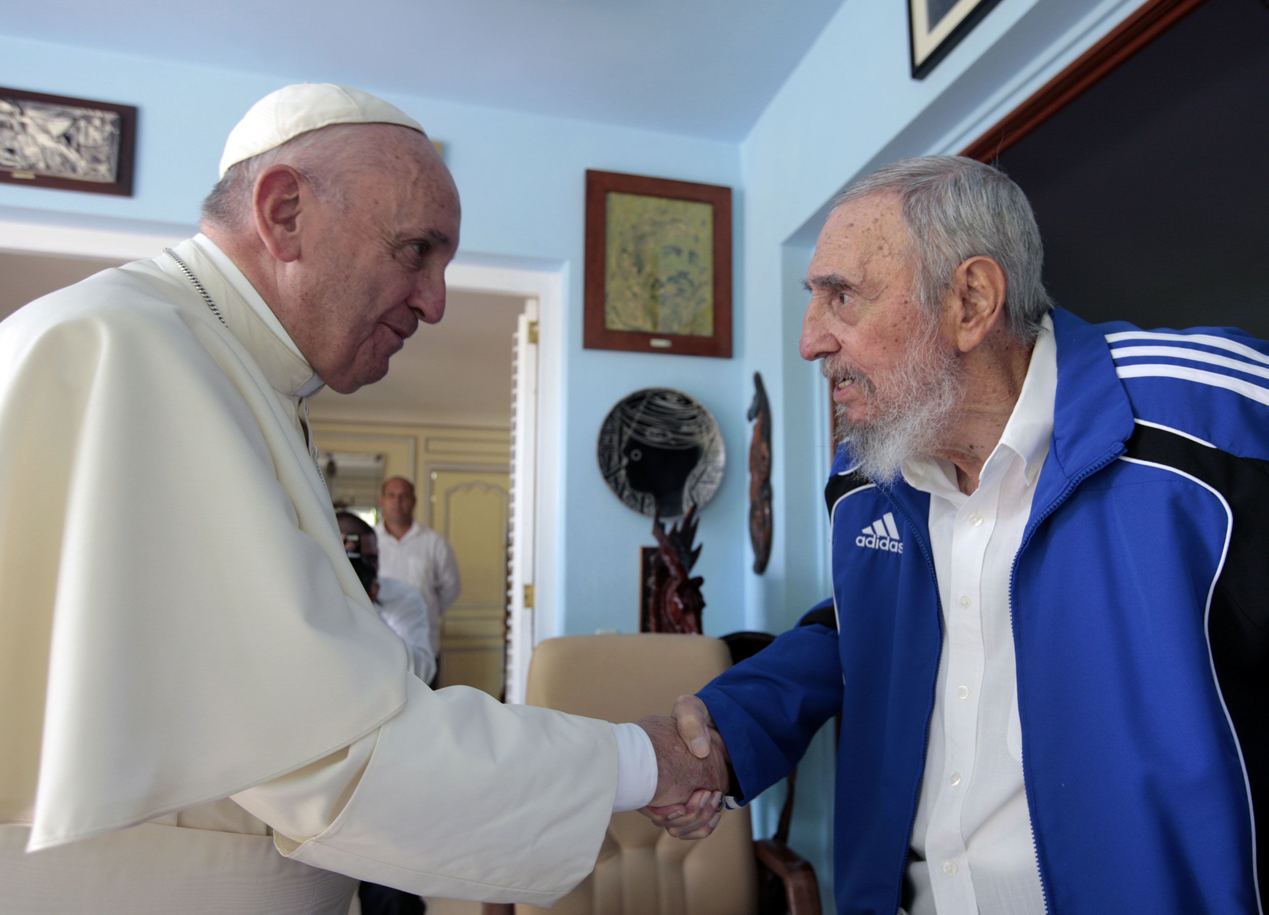 Francis shakes hands with former Cuban leader Fidel Castro in September 2015.