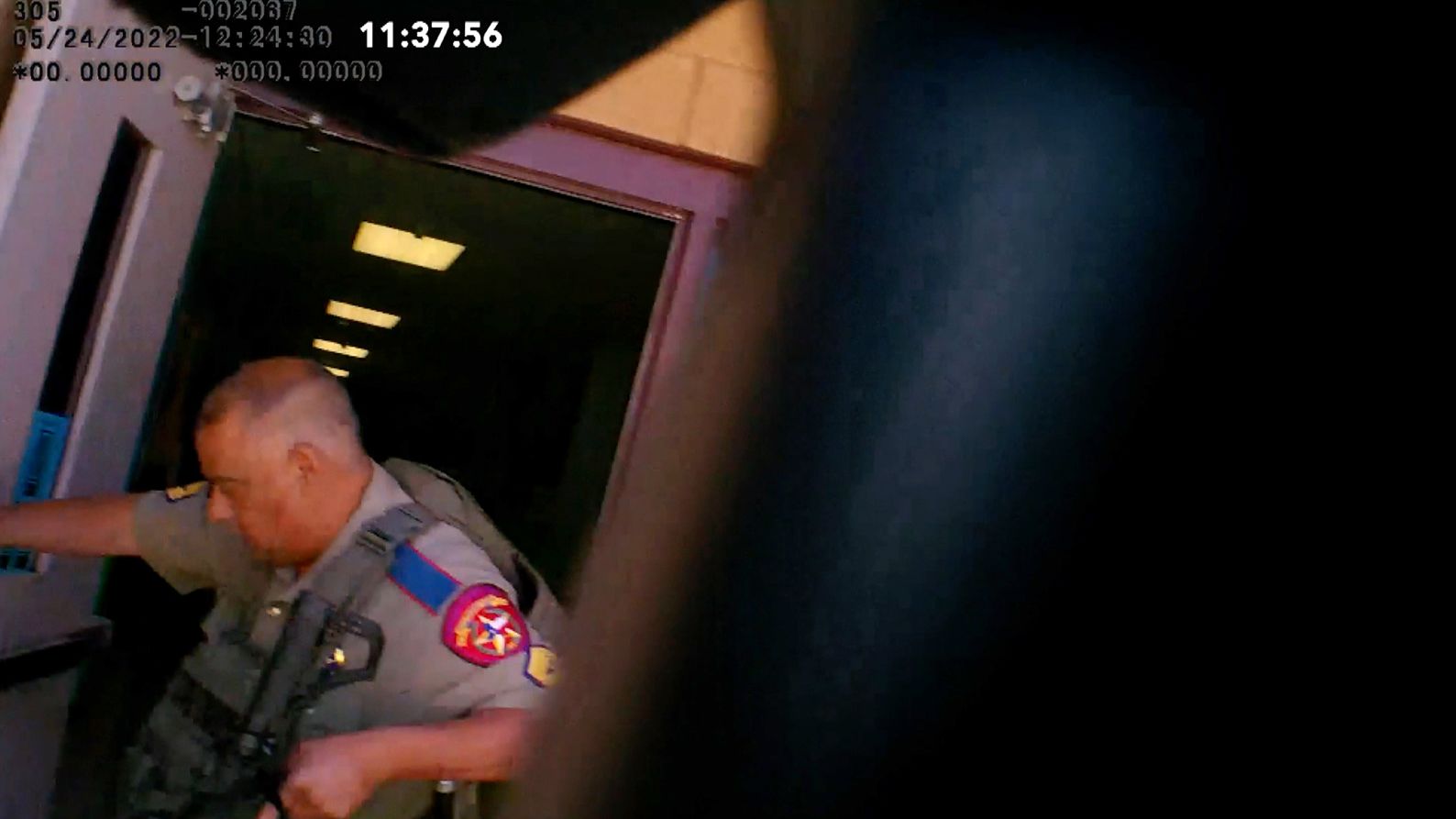 Body camera video shows a DPS trooper was already at the west entrance of the school building nearly 5 minutes earlier than previously known.