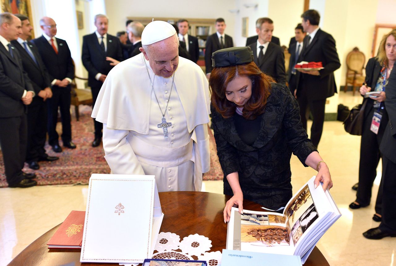 The Pope is presented with a gift by Argentine President Cristina Fernández during a private audience at the Vatican in March 2014.