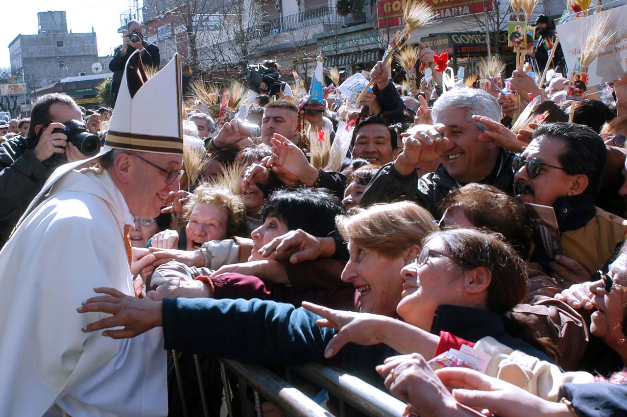 Francis greets parishioners in Buenos Aires.