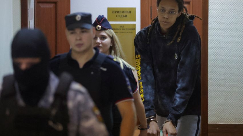 U.S. basketball player Brittney Griner, who was detained at Moscow's Sheremetyevo airport and later charged with illegal possession of cannabis, is escorted before a court hearing in Khimki outside Moscow, Russia July 26, 2022. REUTERS/Evgenia Novozhenina/Pool