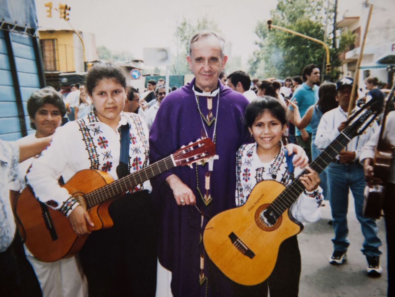 Francis poses for a photo during an Easter procession in 2000. A couple of years earlier he had become the archbishop of Buenos Aires.