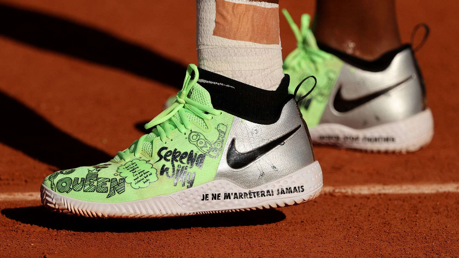 Williams wears custom Nike sneakers at the French Open in 2021. Williams partnered with Nike to launch a <a href="index.php?page=&url=https%3A%2F%2Fwww.cnn.com%2F2021%2F08%2F17%2Fbusiness%2Fnike-serena-williams-swdc%2Findex.html" target="_blank">collection of athleisure wear</a> created by emerging designers.