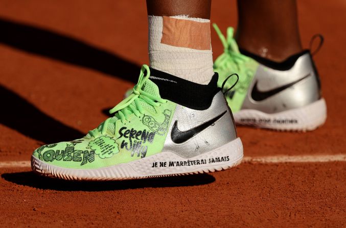 Williams wears custom Nike sneakers at the French Open in 2021. Williams partnered with Nike to launch a <a href="index.php?page=&url=https%3A%2F%2Fwww.cnn.com%2F2021%2F08%2F17%2Fbusiness%2Fnike-serena-williams-swdc%2Findex.html" target="_blank">collection of athleisure wear</a> created by emerging designers.