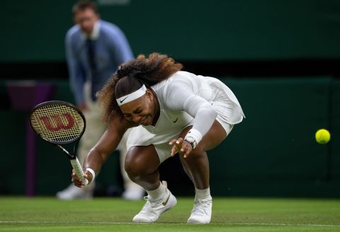 Wiliams winces in pain during a first-round Wimbledon match in 2021. She was forced to retire from the match due to the injury.