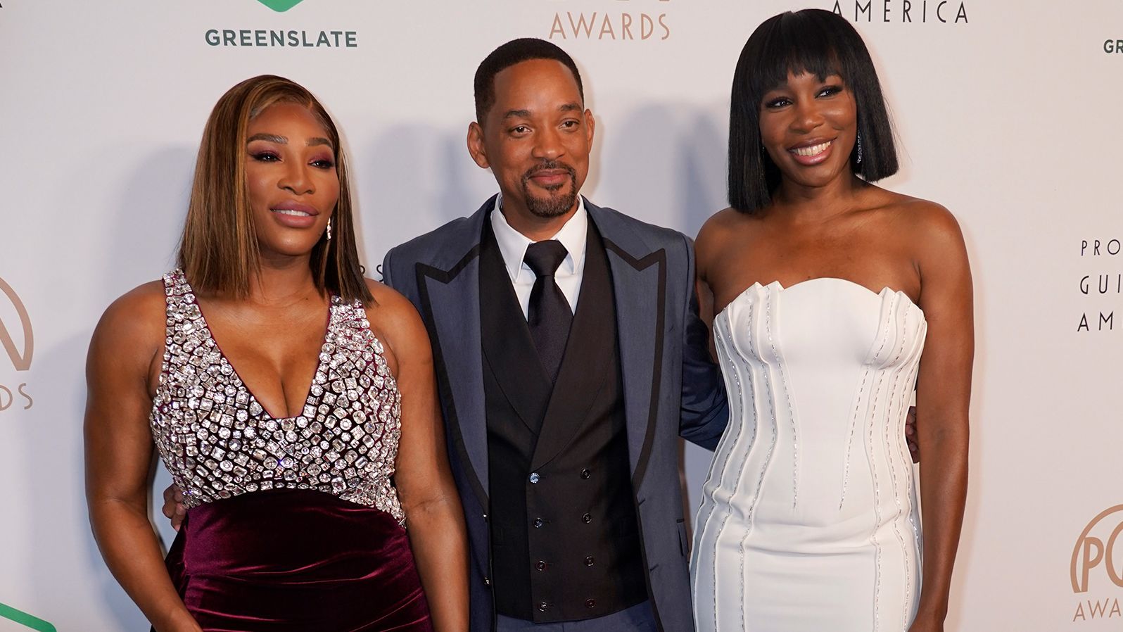 Williams is joined by her sister Venus and "King Richard" star Will Smith at the Producers Guild Awards in March.