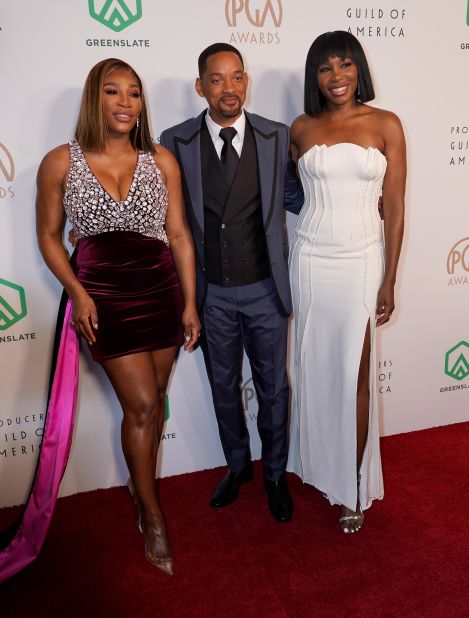 Williams is joined by her sister Venus and "King Richard" star Will Smith at the Producers Guild Awards in March.