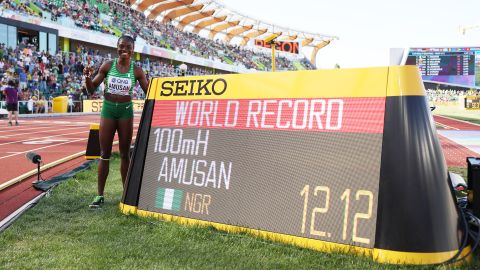 Amusan of poses with her world record in the Women's 100m hurdles semi-final on day ten of the World Athletics Championships.