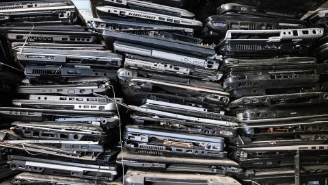 Old laptop cases are piled up on shelves as an NGO collects, treats, recycles and reuses e-waste in an informal settlement in Nairobi, Kenya, December 3, 2021.