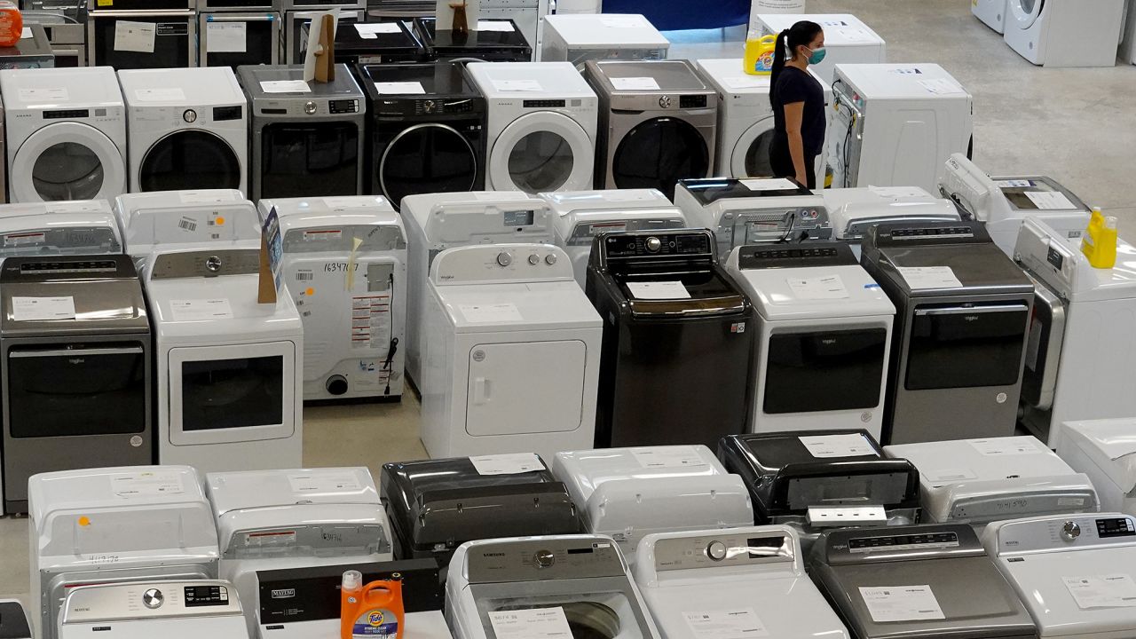 Costs for almost everything have been on the rise. Here washers and dryers are on display at a Lowe's Home Improvement store in Miami. 