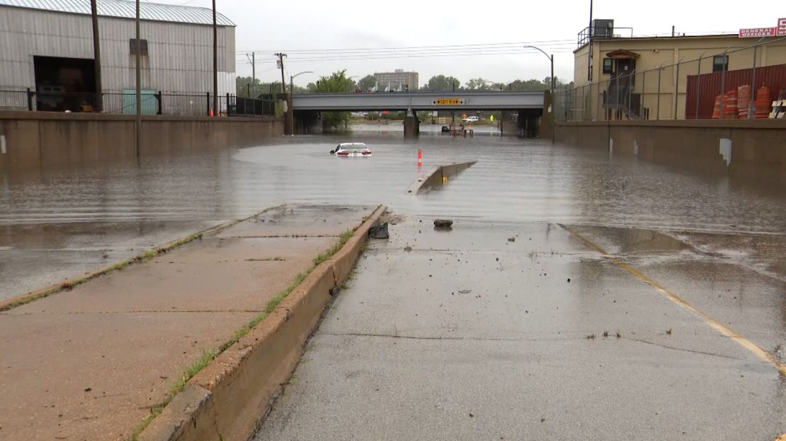 A car is submerged in flood waters after St. Louis recieved record-breaking rainfall Tuesday.