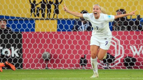 England striker Beth Mead celebrates after scoring her team's first goal against Sweden.