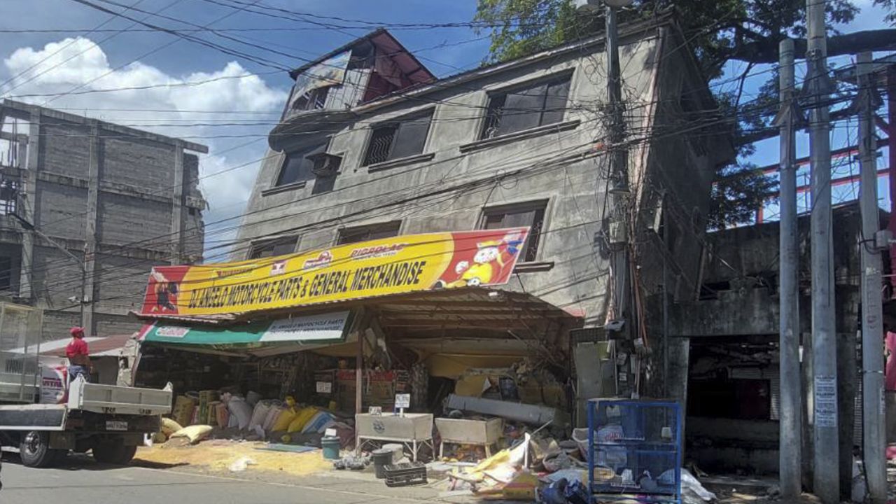A damaged building lies on its side after an earthquake in the Philippines' Abra province on July 27.