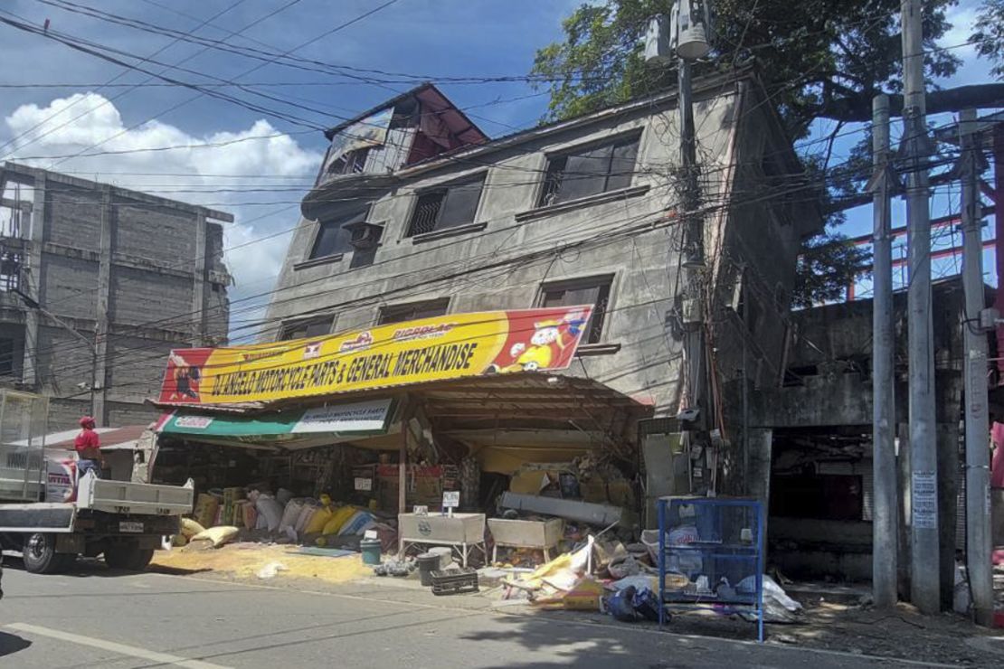 A damaged building lies on its side after an earthquake in the Philippines' Abra province on July 27.
