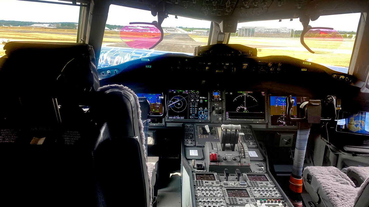 The plane's "modern" cockpit features heads-up displays. 