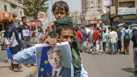 Yemeni demonstrators hold a portrait of UN special envoy Hans Grundberg during a protest demanding the end of a years-long blockade of the area imposed by Yemen's Houthi rebels on the city of Taiz, on July 26. Taiz, which has a population of roughly 600,000 people, has been largely cut off from the world since 2015, with hundreds of thousands suffering from malnutrition. 