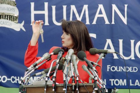 Pelosi, speaking at the US Capitol in June 1991, holds a watch that was reportedly smuggled out of China. She said the watches were given to soldiers who helped crush the Tiananmen Square protesters in 1989.