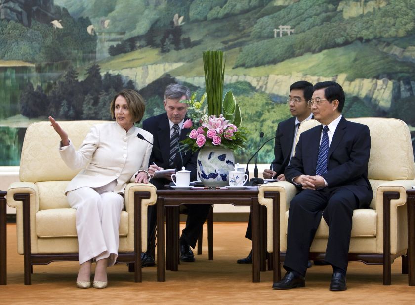 Pelosi introduces her delegates to Chinese President Hu Jintao during their meeting in Beijing in May 2009. Pelosi was leading a congressional delegation on a working visit devoted to energy and climate change.