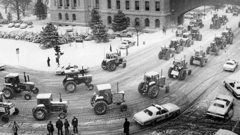 Farmers drive tractors in Washington, DC, in February 1979.