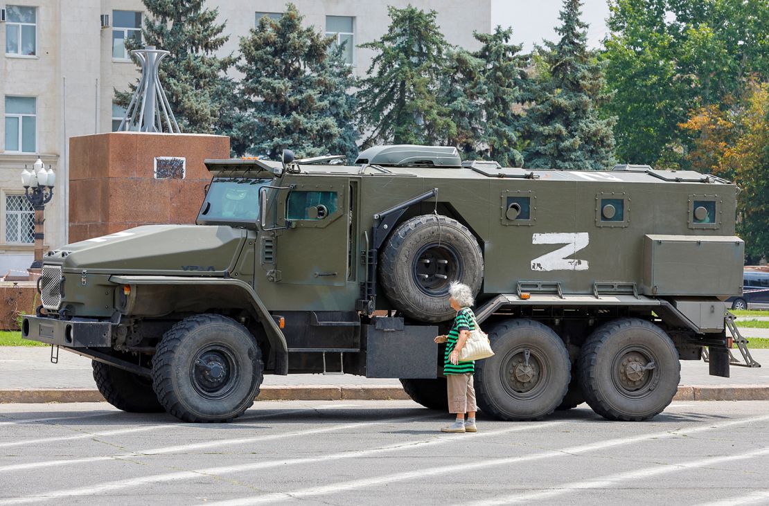 An armoured truck emblazoned with a pro-Russian "Z" symbol parked near Ukraine's former regional council building in Kherson on July 25.
