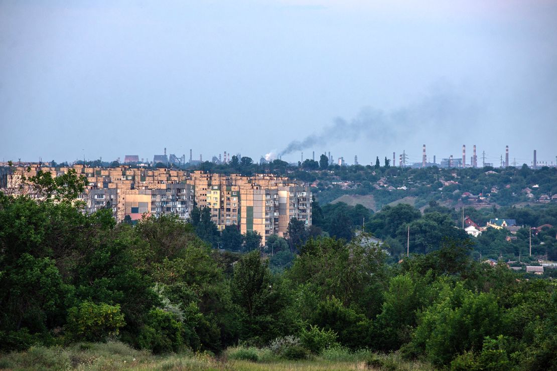 Smoke rises over the city skyline in Kryvyi Rih in late June.