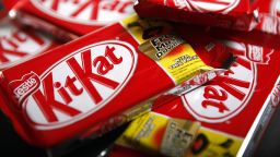 Bars of original KitKat chocolate, produced by Nestle SA, and without the "Fairtrade" logo sit arranged for a photograph in London, U.K., on Monday, Dec.7, 2009. 