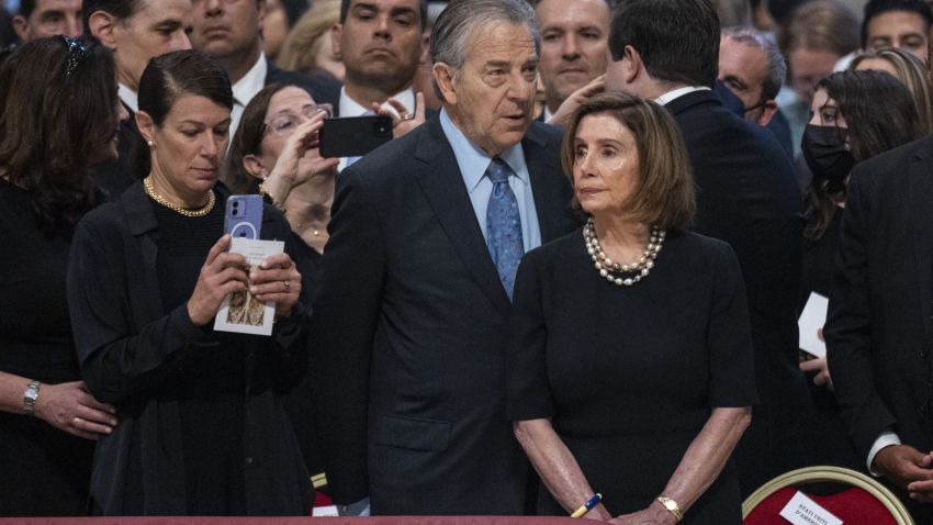 Speaker of the US House of Representatives Nancy Pelosi (R) and her husband Paul Pelosi (C) attend the solemn mass of Saints Peter and Paul led by Pope Francis in St.  Peter's Basilica.