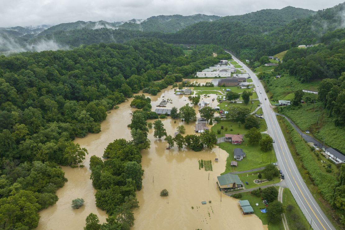 Home and structures are flooded near Quicksand, Kentucky, on Thursday.