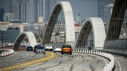 Skid marks cover many portions to the new 6th street bridge in Los Angeles, CA Wednesday, July 27, 2022. The LAPD has put more enforcement on the bridge to help cut down on street take-overs, tagging, cruising and other problems since the reopening of the bridge.