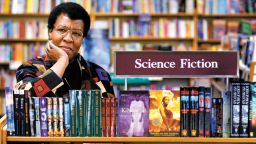 Octavia Butler poses for a portrait near some of her novels at University Book Store in Seattle, Wash. On Friday, March 5, 2021, scientists announced that they've named the touchdown site of the Perseverance Mars rover in honor of the late writer, who grew up next door to the Jet Propulsion Laboratory in Pasadena. She was one of the first African Americans to receive mainstream attention for science fiction. (Joshua Trujillo/seattlepi.com via AP)