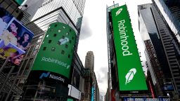 The logo of Robinhood Financial LLC, is seen on the Nasdaq stock exchange for the company's initial public offering in New York, New York, USA, 29 July 2021.  Robinhood, a financial services company that allows its users to trade stocks, ETFs, and cryptocurrency, priced its shares at 38 dollars per share in its initial public offering (IPO), putting the value of the company at 32 billion dollars.