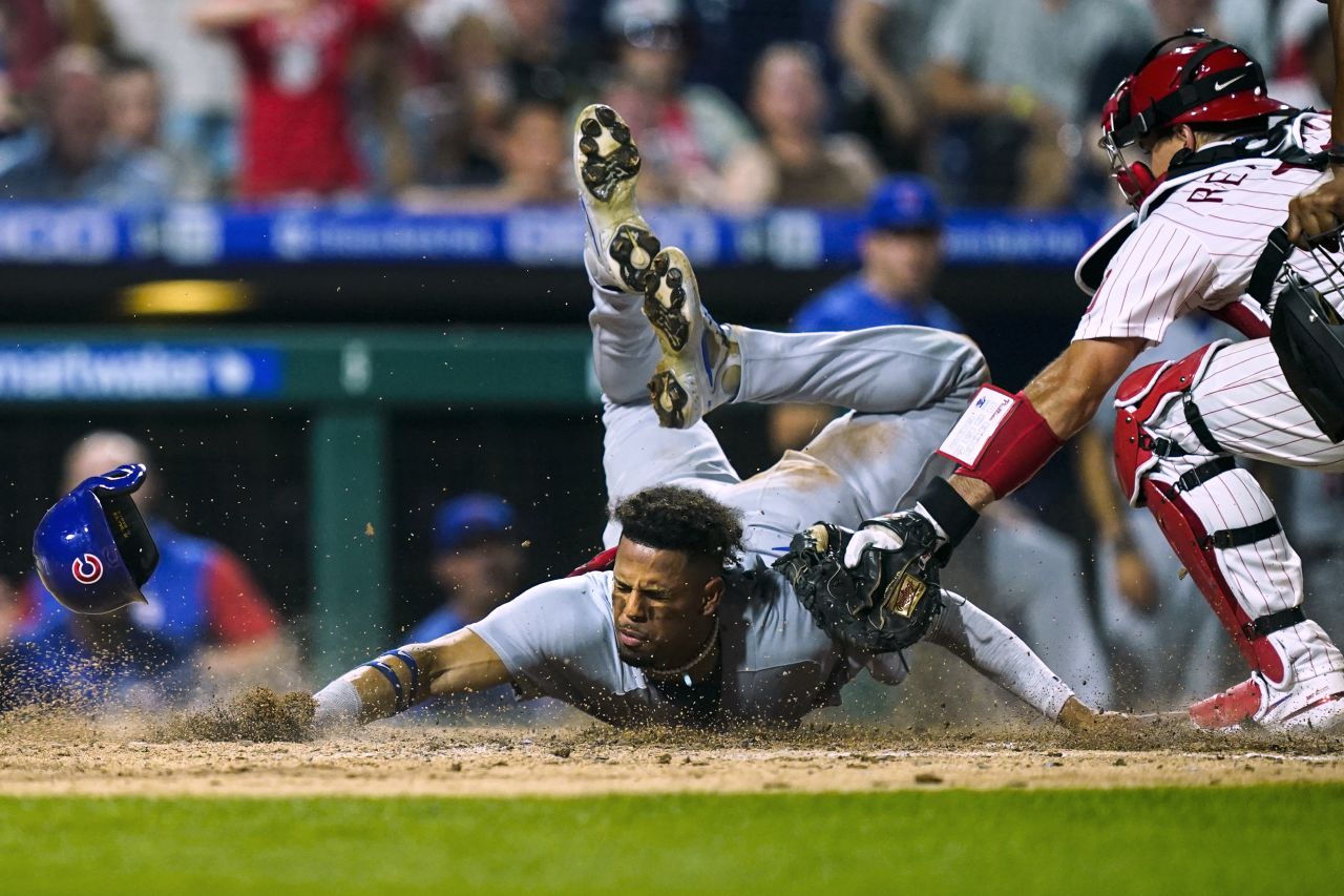 Christopher Morel slides into home to score a run for the Chicago Cubs during a Major League Baseball game in Philadelphia on Saturday, July 23. The Cubs won 6-2 in 10 innings.